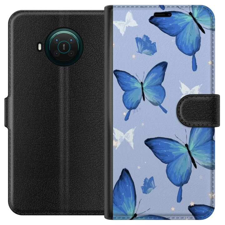 Wallet case for Nokia X20 with Blue butterflies design in the group SMARTPHONE & TABLETS / Phone cases / Nokia/Microsoft at TP E-commerce Nordic AB (A56112)