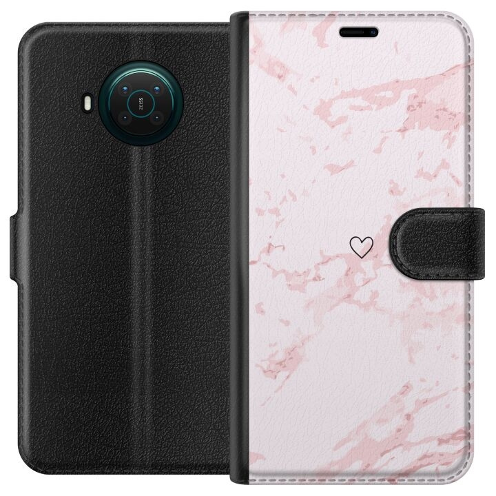 Wallet case for Nokia X20 with Pink Heart design in the group SMARTPHONE & TABLETS / Phone cases / Nokia/Microsoft at TP E-commerce Nordic AB (A56119)