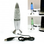 Lava lamp with glitter, lights up in several different colors. Lava lamp with glitter, lights up in several different colors.
