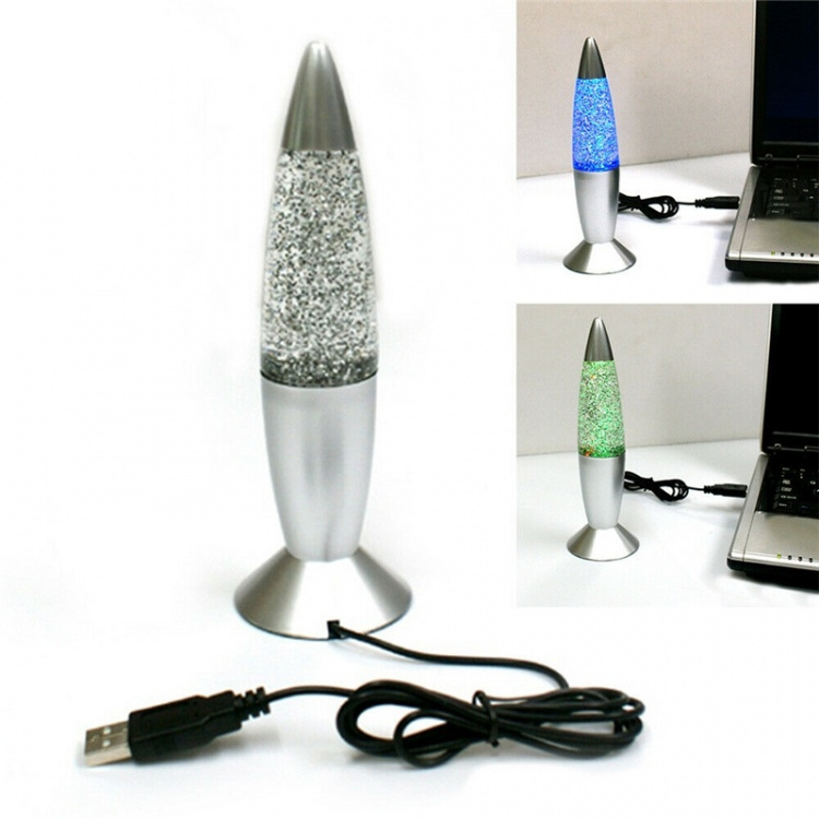 Lava lamp with glitter, lights up in several different colors. Lava lamp with glitter, lights up in several different colors.